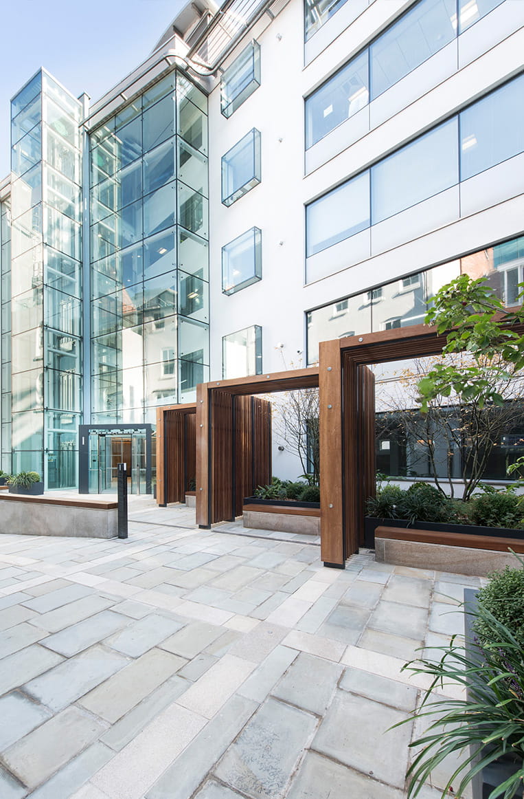 Seating area in the courtyard of Edmund Gardens.